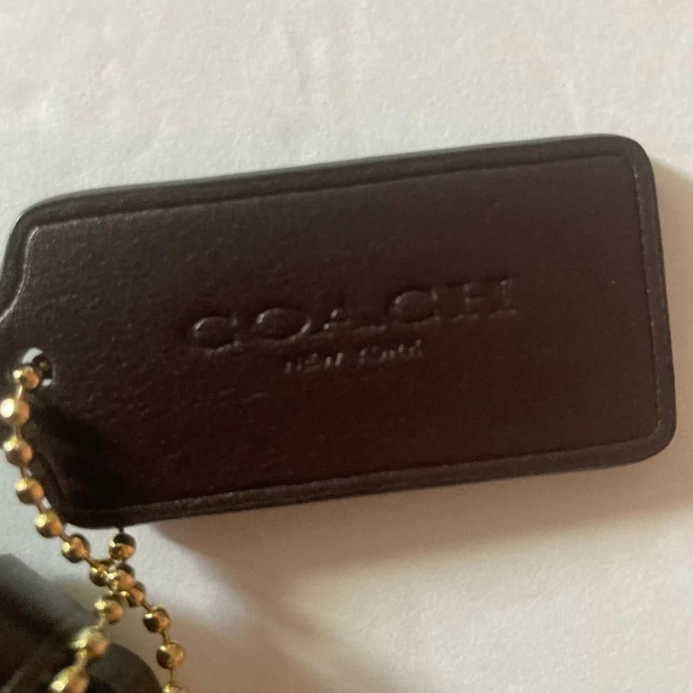 Coach Brown Crossbody Bag with Floral Accents like new